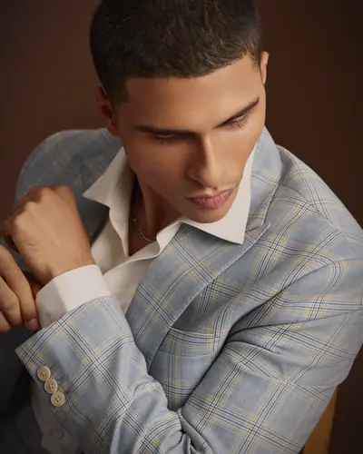 A jacket lapel in the hand