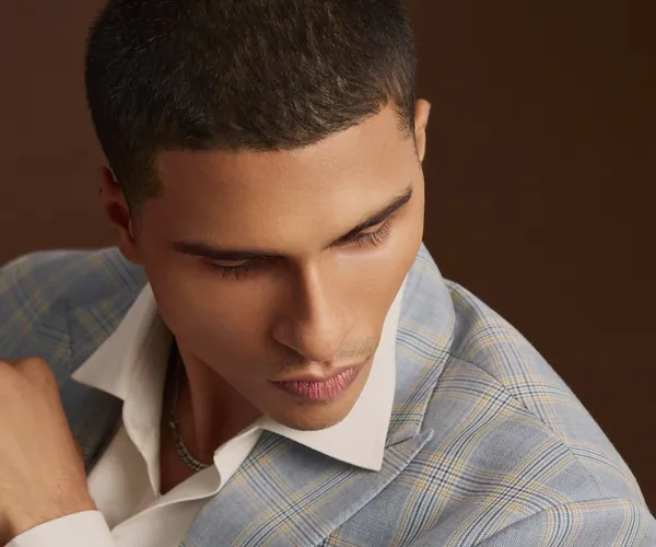 The sleeve: Working cuff buttons · the check matched across the sleeve.