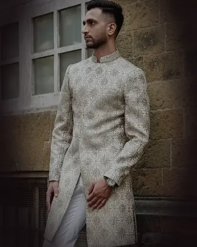 The ivory sherwani, worn