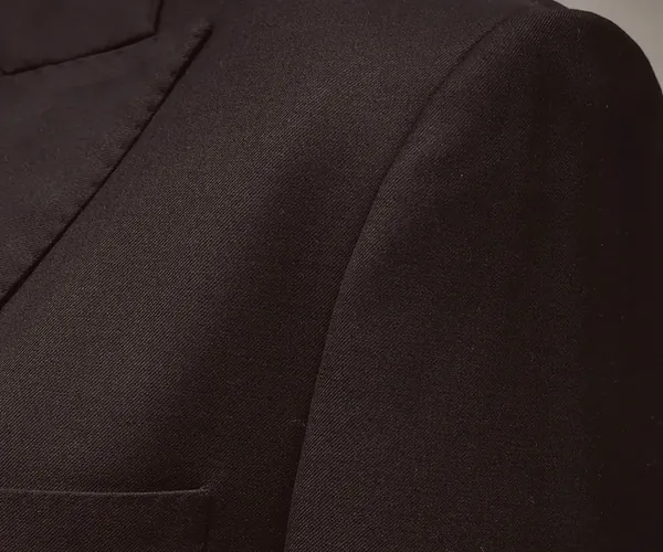 Classic Jacket: Peak lapel · in navy.
