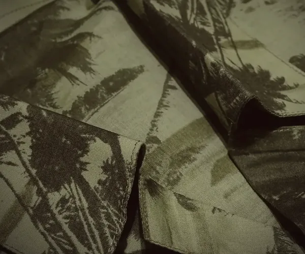 Hawaii Shirt: Camp collar · in palm print.