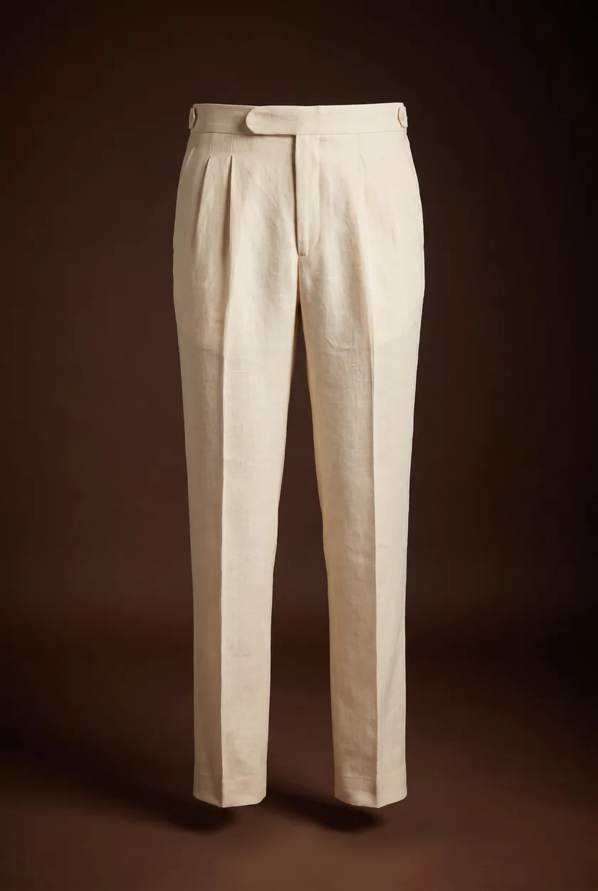 Riviera Trouser, cream linen, two pleats, extended tab, buttoned side tabs