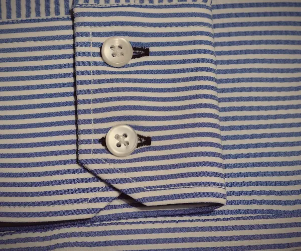 Windsor Shirt: Two buttons at the cuff.