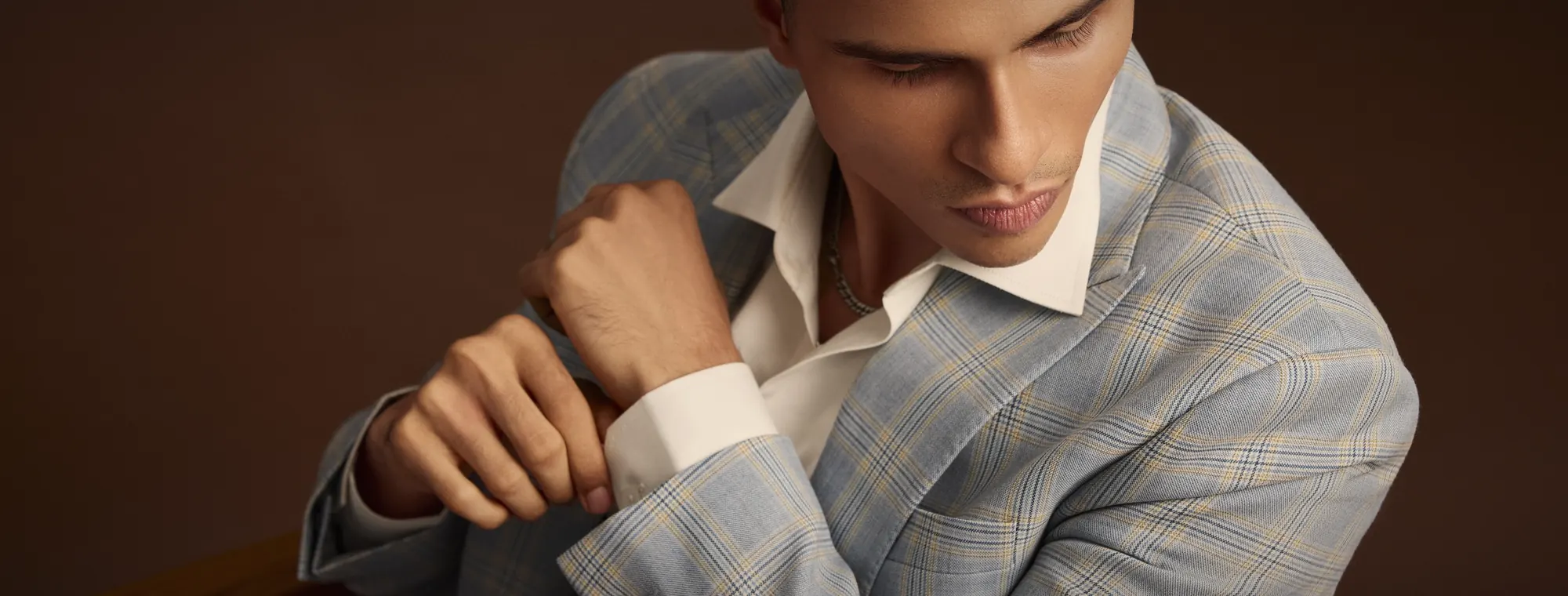 Windowpane check · working cuff, cut at the atelier