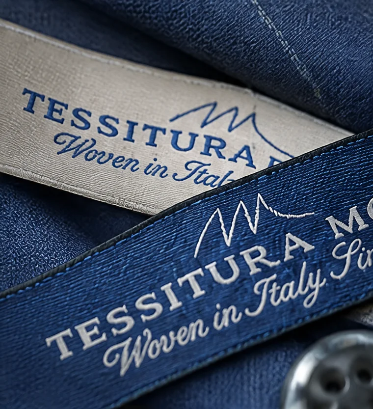 Tessitura Monti woven label on its cloth