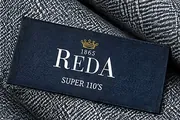Reda woven label on its cloth